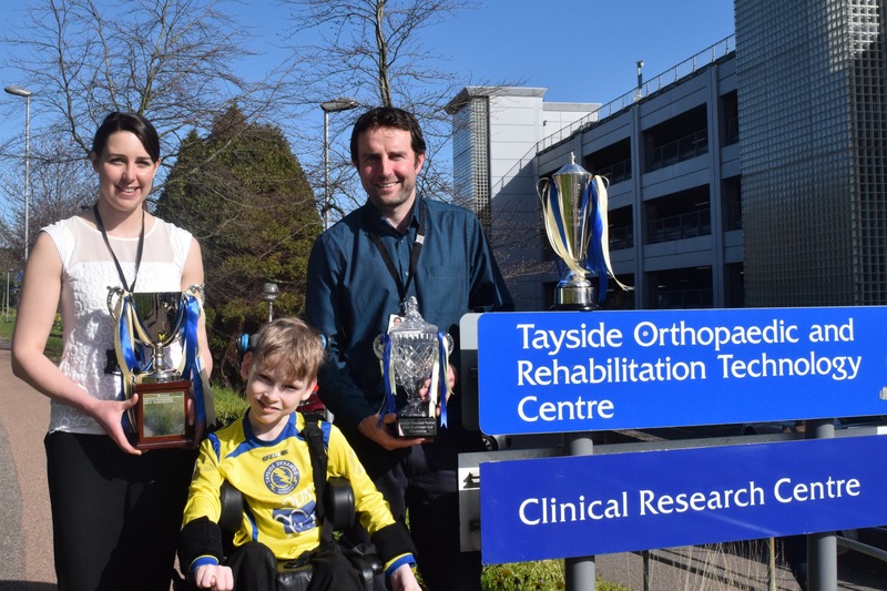 Tayside Dynamos Powerchair Football Club thank TORT Centre for support