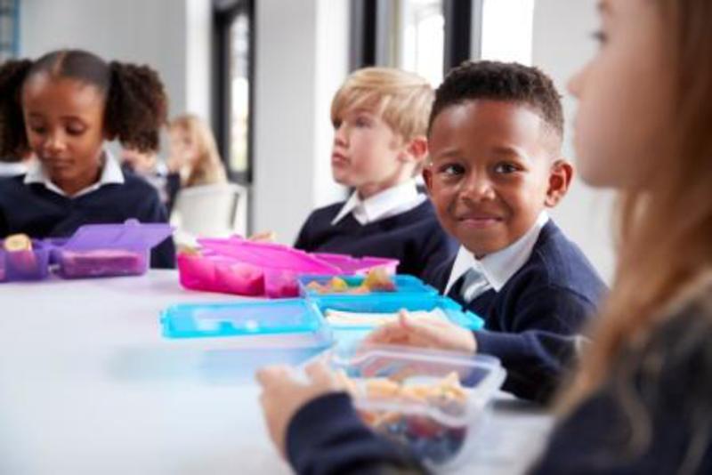 Image of school children eating lunch